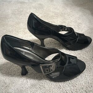 Great condition Black Patent heels with open toe and fun buckle & side cut out